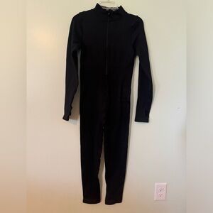 Black ribbed body suit with quarter zipper and thumb holes - never worn